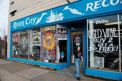 Exterior of a record store on a sunny day