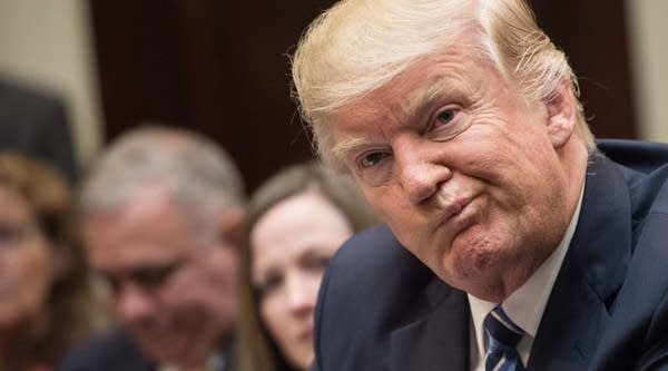 President Donald Trump attends a meeting about healthcare in the Roosevelt Room at the White House in Washington, DC, on March 13, 2017.