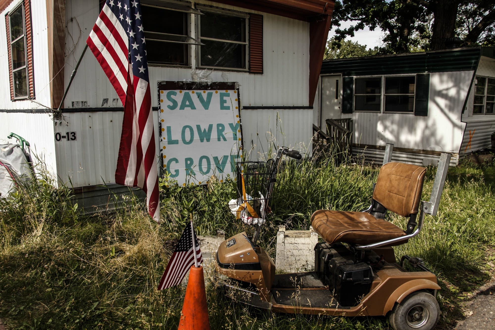 A sign outside Bill McConnell's trailer protests Lowry Grove's closure