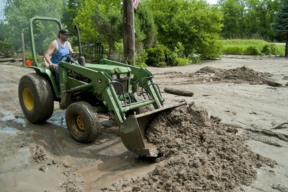 Clearing away the mud
