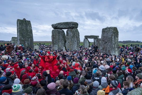 People celebrate the Winter Solstice sunrise 