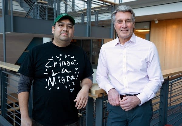 two men posing for a portrait