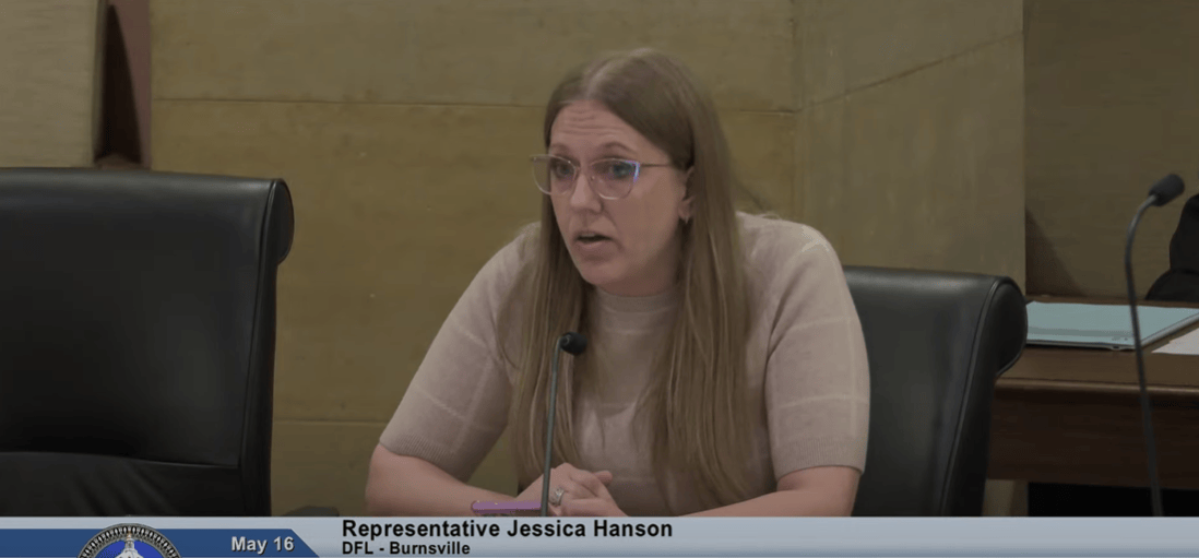 woman speaks to committee