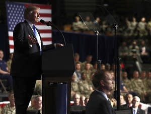 President Donald Trump speaks at Fort Myer in Arlington Va.