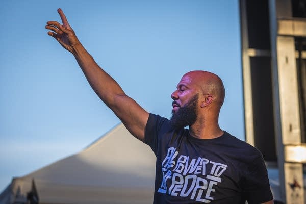 A man points to the sky