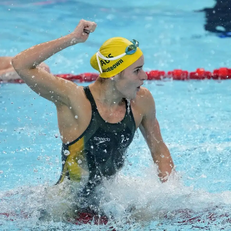 93f2a1-20240731-swimmer-raises