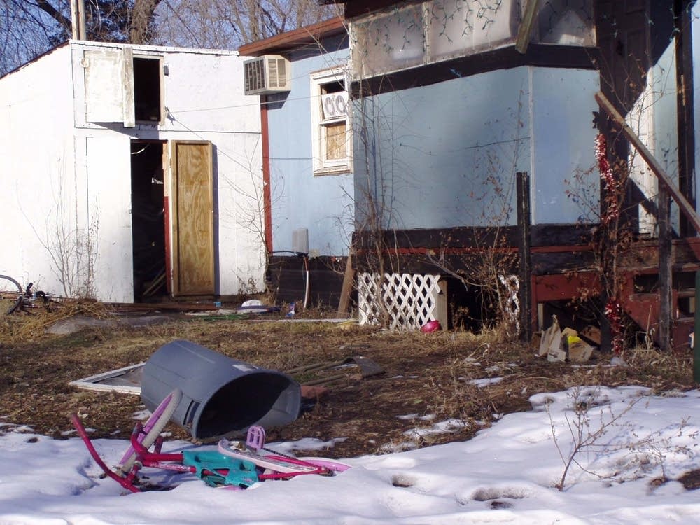 An abandoned, dilapidated trailer at Shady Lane