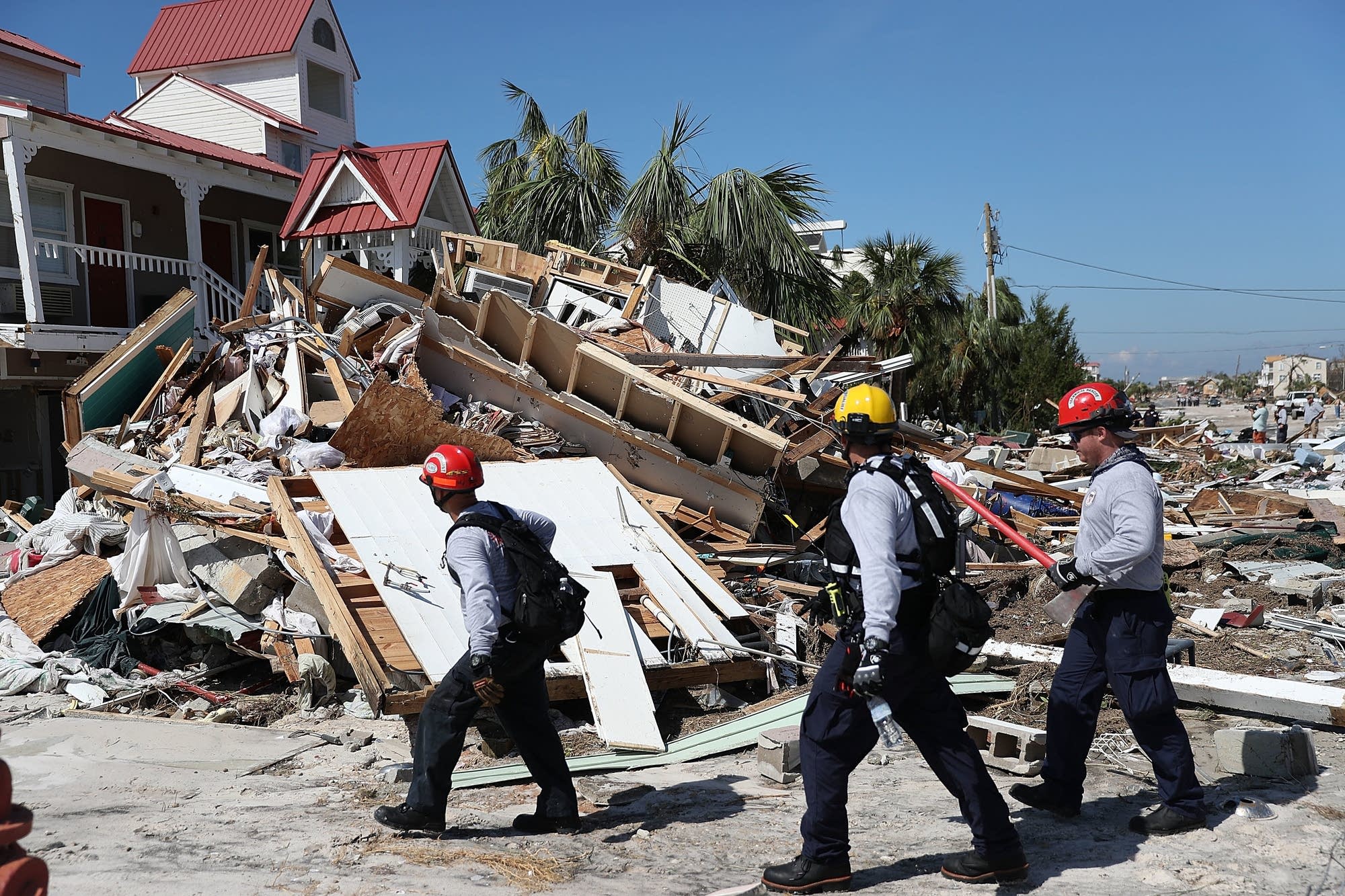 Rescuers search for survivors.
