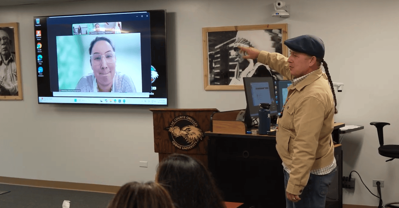 man in tan shirt teaching course