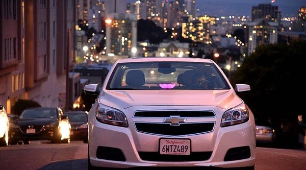 A Lyft driver is waiting for a ride in the city on Feb. 3, 2016 in San Francisco, California. 