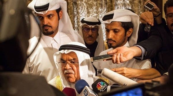 Saudi Arabia's minister of Oil and Mineral Resources Ali al-Naimi (C) speaks to the press ahead of a meeting on February 16, 2016 in the Qatari capital Doha, with Qatar's, Venezuela's and Russia's ministers for energy and petrol. Energy giants Saudi Arabia and Russia agreed to freeze oil output to try to stabilise the market if other major producers do the same, Qatar's oil minister said.