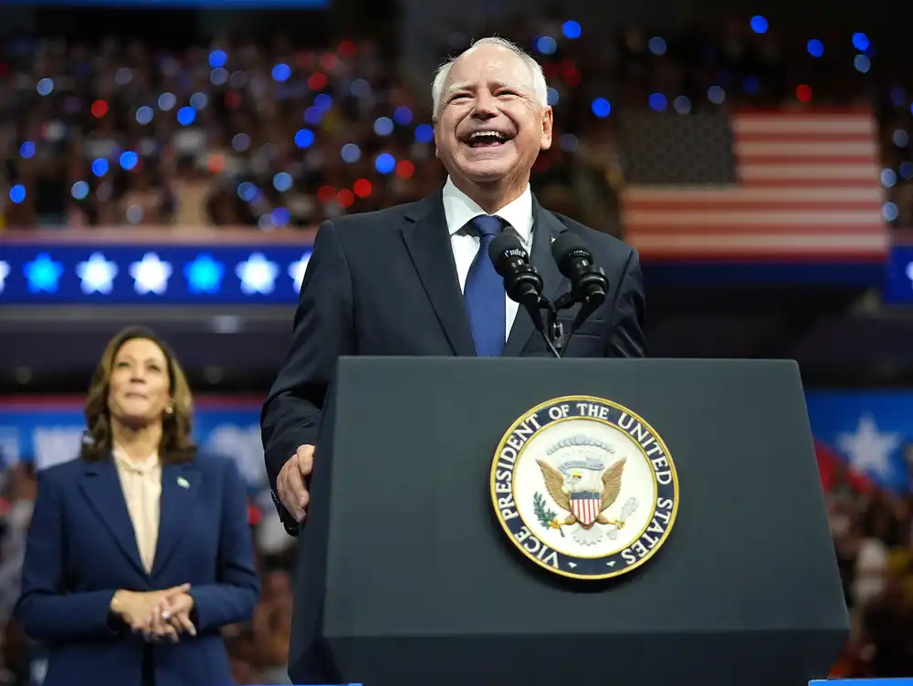 55dbce-20240806-a-man-smiles-