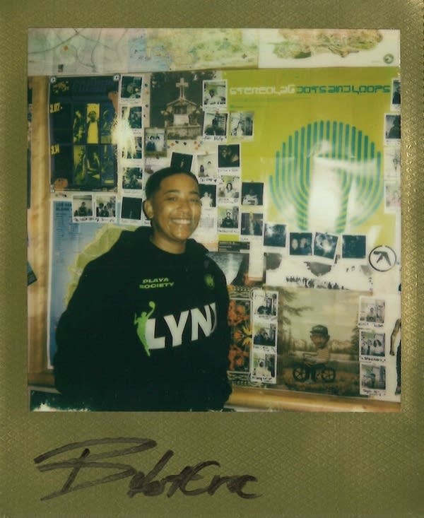 bdotcroc posing in a polaroid photo