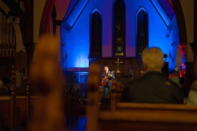 Man performing inside church