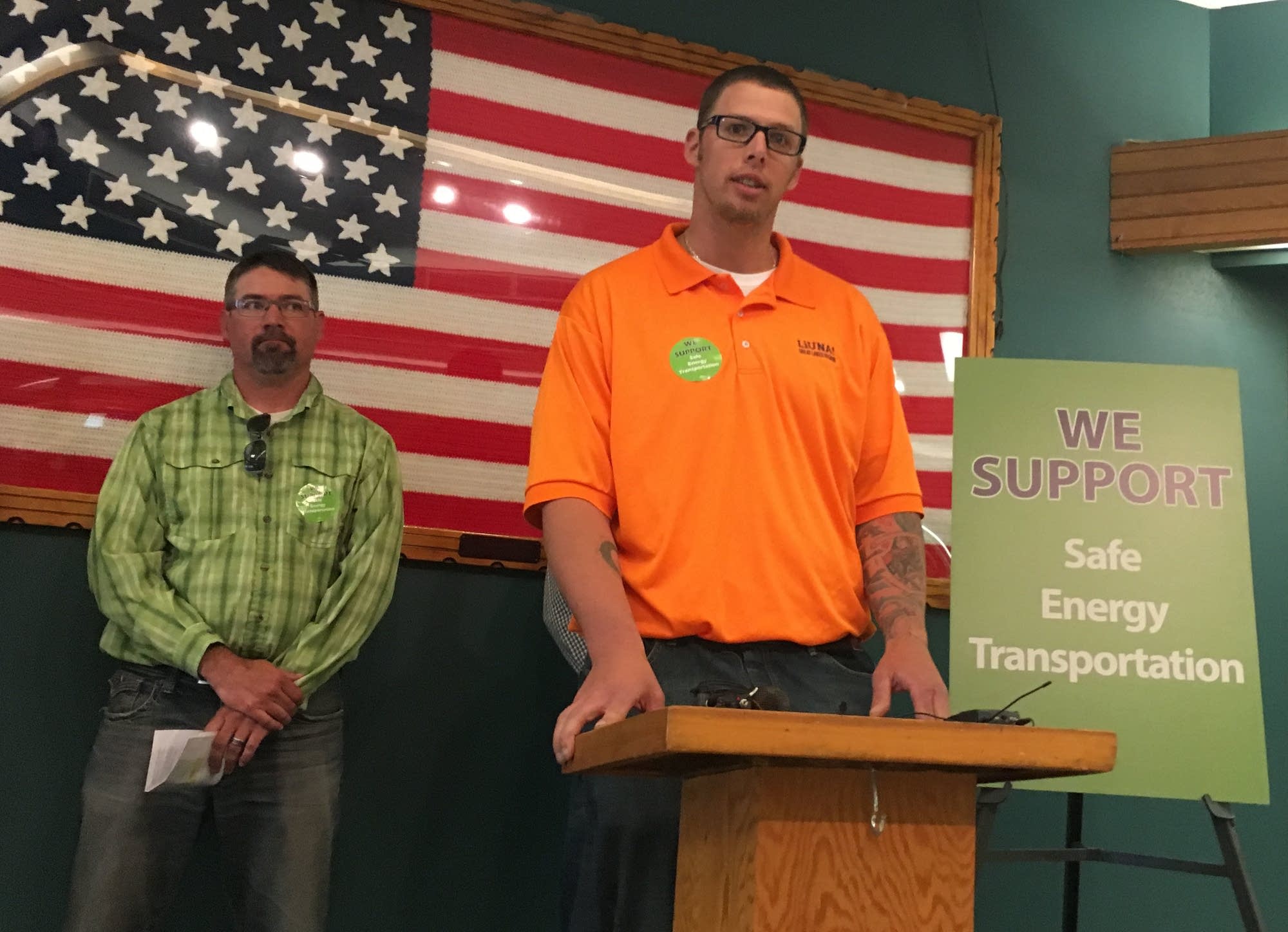 Derek Pederson speaks at a news conference.