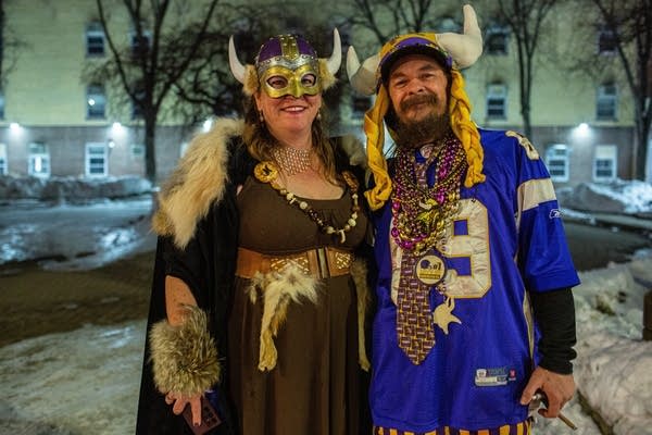 Two fans pose after the Minnesota Vikings game