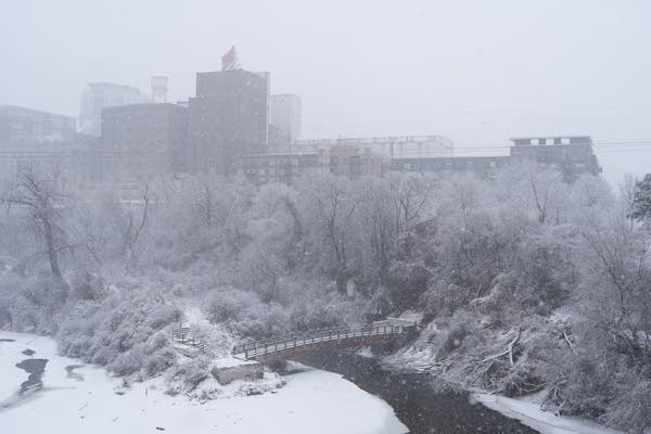 Snow covers the banks of the Mississippi River.