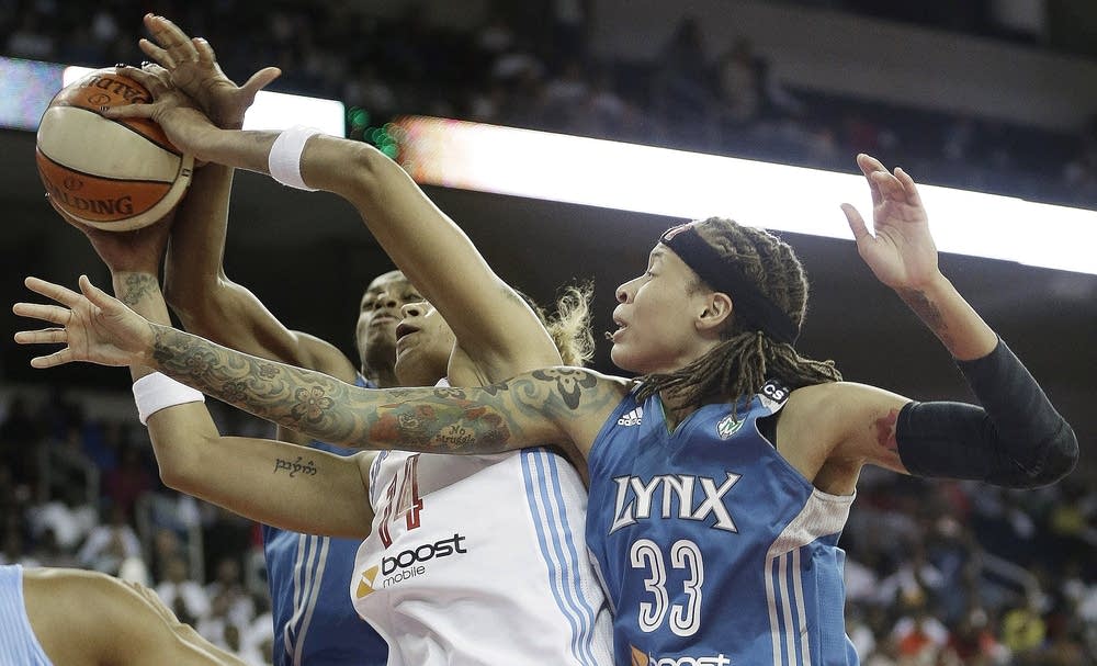 Erika de Souza ,Seimone Augustus