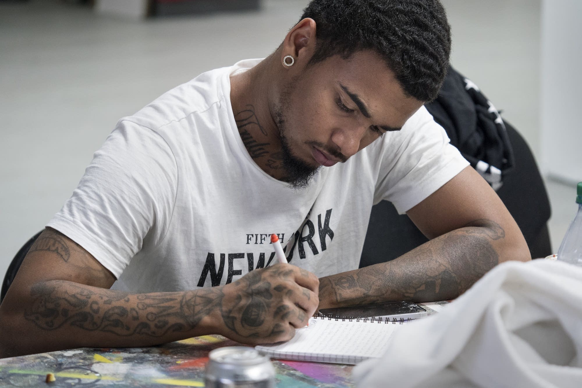 Ka'Shaun Gage, 23, writes in a journal during a quiet time.