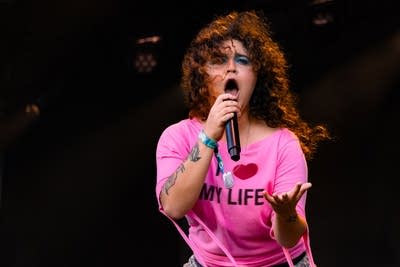 remi wolf and her band performing on stage