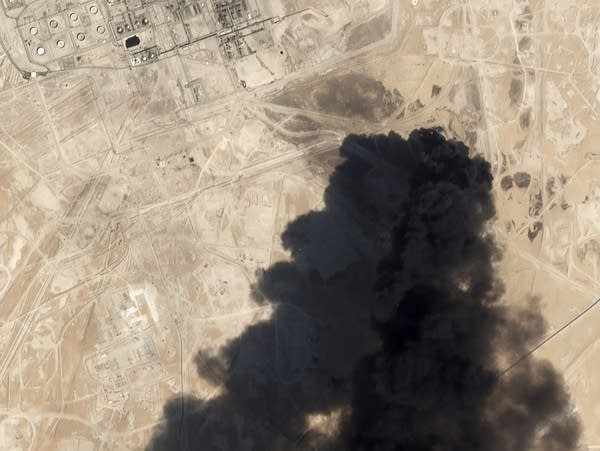 Thick black smoke rises from Saudi Aramco's Abqaiq oil processing facility