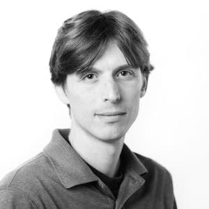 A headshot of Will Evans, a reporter for Reveal.