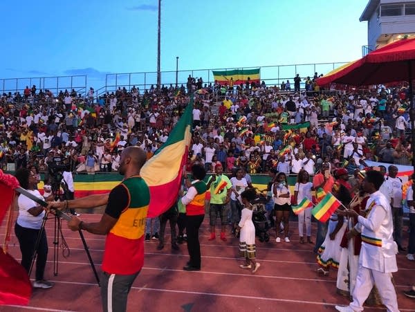 Fans in bleachers with Ethiopian flags