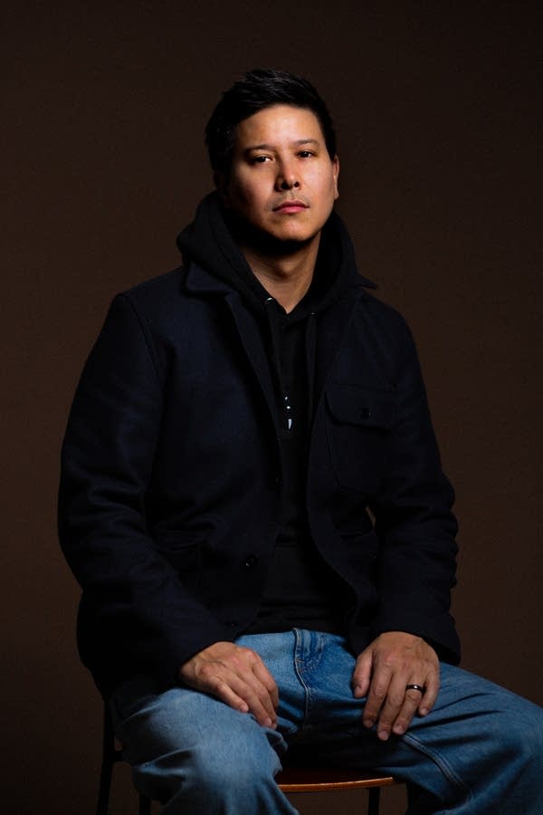 A person poses for a photo