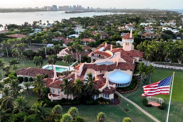 Aerial view of Donald Trump's Mar-a-Lago resort near the shoreline.