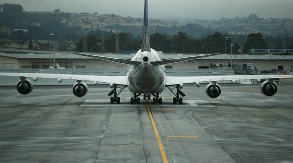A United Airlines plane sits on the tarmac at San Francisco International Airport.
