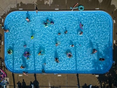 Minnesotans seek relief at pools, cooling centers as dangerous heat grips state