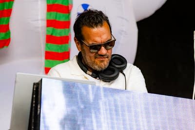 Atmosphere perform on an outdoor stage.