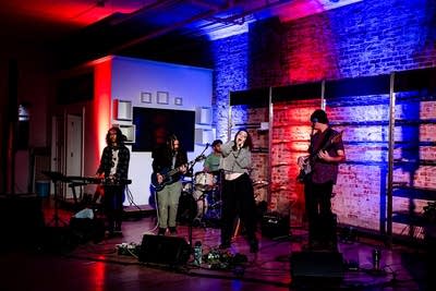 A band performing onstage