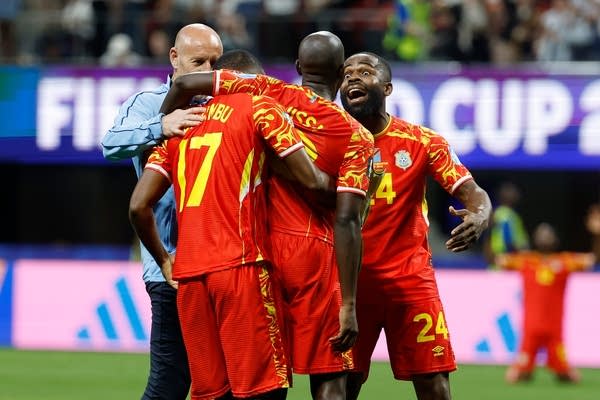 Congo rallies to a 3-1 win against Uzbekistan to seal place in the World Cup knockouts