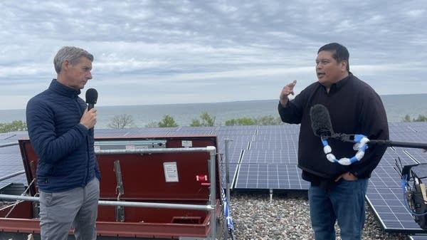 Kai Ryssdal, left, and Bob Blake, right, on the roof of the Red Lake Nation Government Center in 2024. 