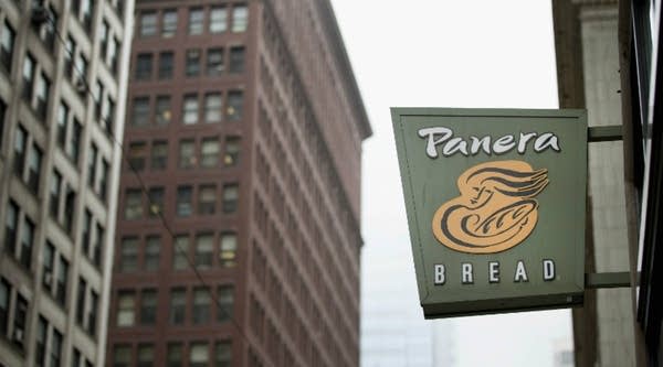 A sign marks the location of a Panera Bread restaurant in Chicago, Illinois.