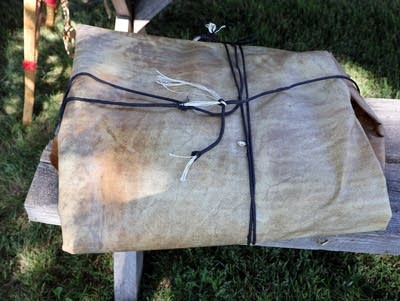 a neatly folded animal hide