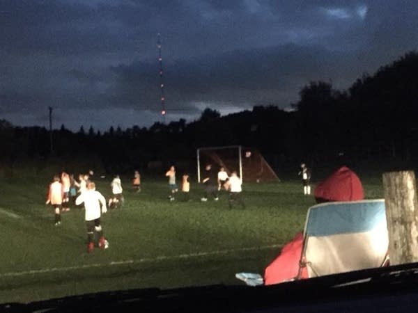 Minnesota soccer under the (car) lights