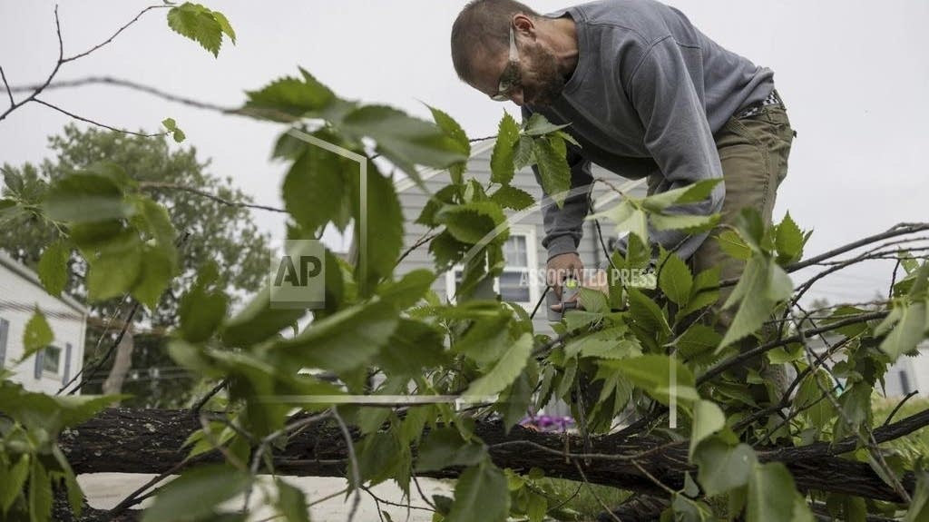 Weekend tornadoes kill 6 in North Dakota and New York, toss trees and train cars