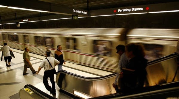 Passengers wait for Metro Rail subway trains during rush hour in Los Angeles, California. 