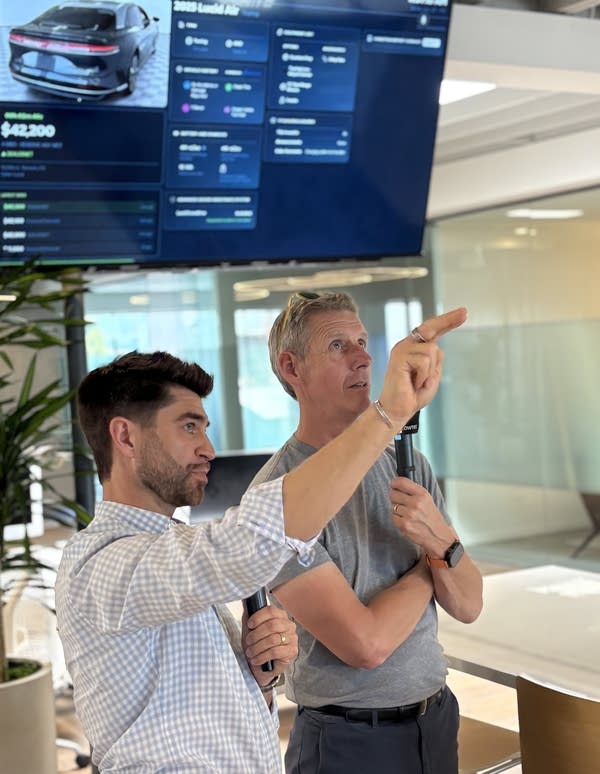 Jimmy Douglas, the founder and CEO of Plug shows "Marketplace" host Kai Ryssdal live data from the company's daily online auction. 
