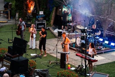 Cloud Cult performing on stage