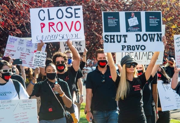 Paris Hilton leads a march to the Provo Canyon School.