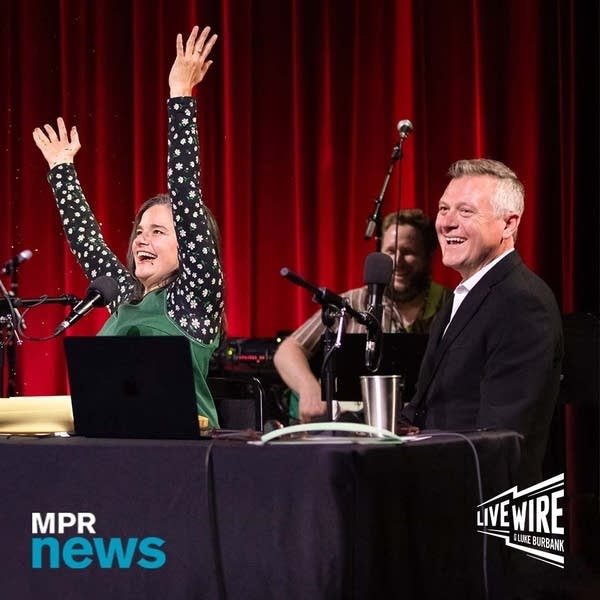 Three people on the radio onstage