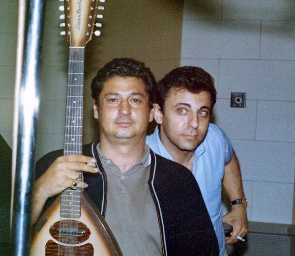 Guitarist Tommy Tedesco and drummer Hal Blaine take a break during a recording session
