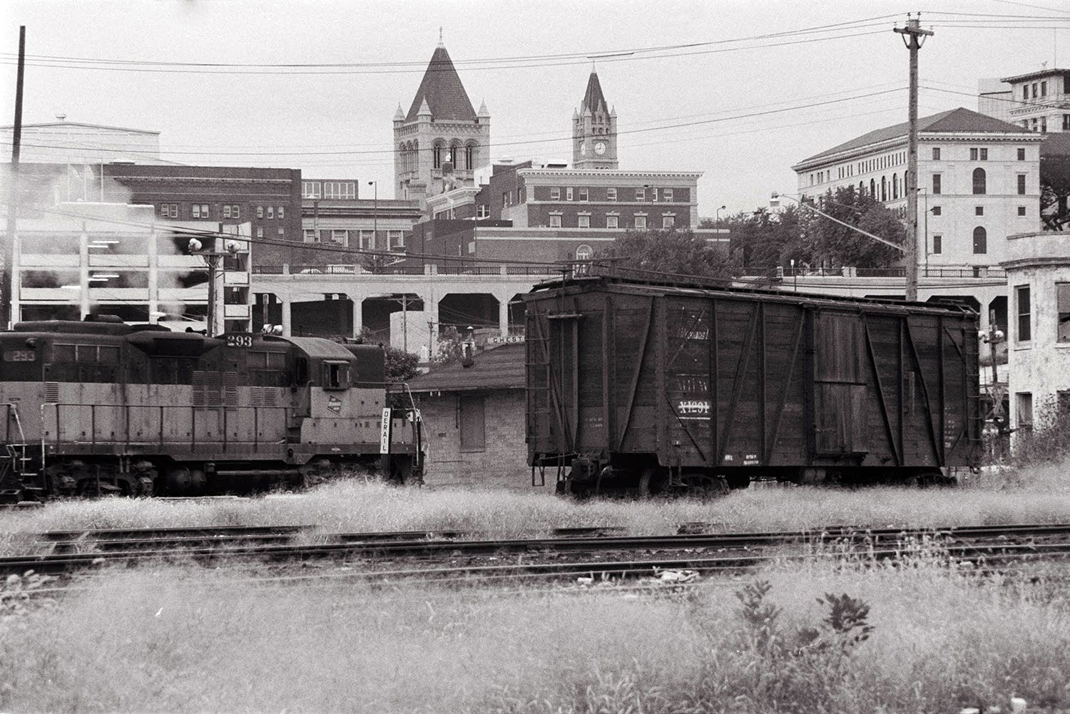 A wooden box car stands on a siding on St. Paul's riverfront in 1978.