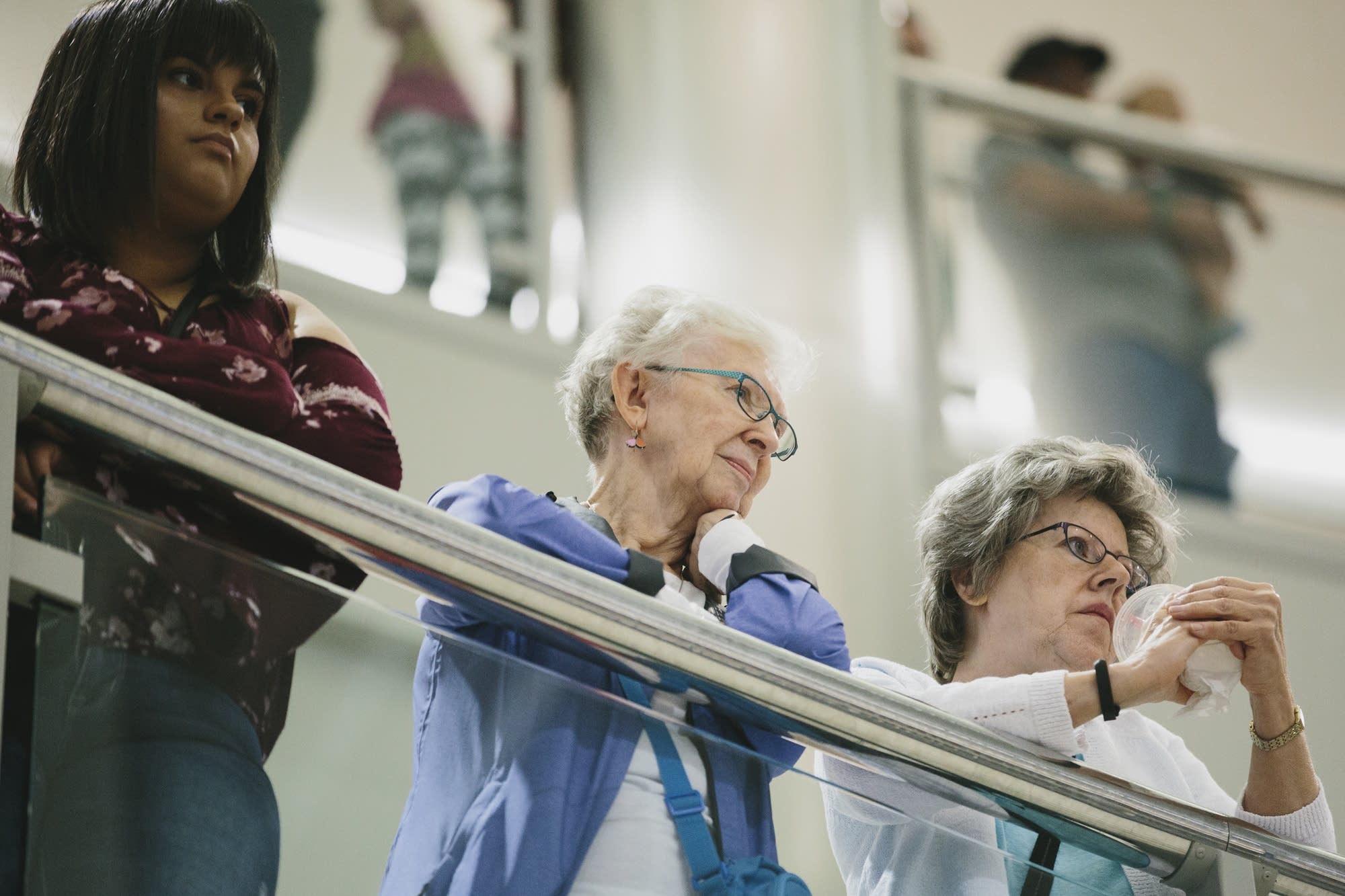 Mall goers watch the renewal ceremony.