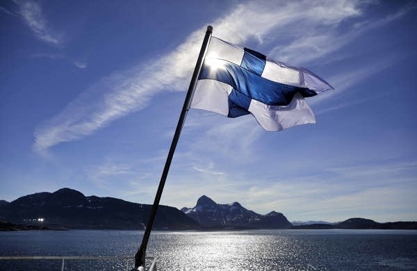 Finland's flag flies aboard the Finnish icebreaker MSV Nordica.