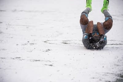 Johan Venegas falls in pain during the home opener.