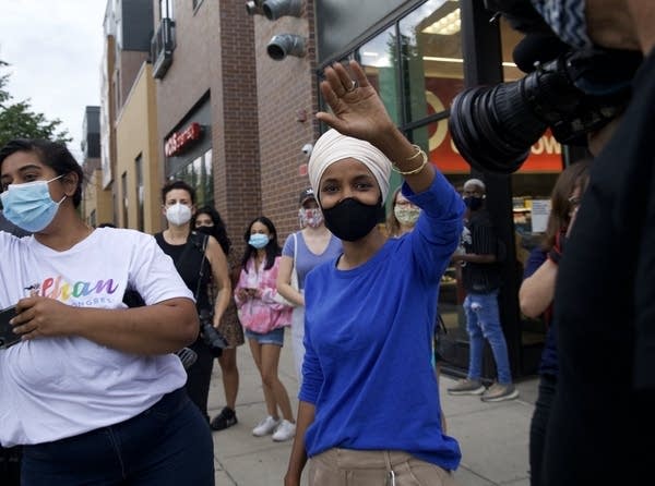 Rep. Ilhan Omar greets supporters in Minneapolis.